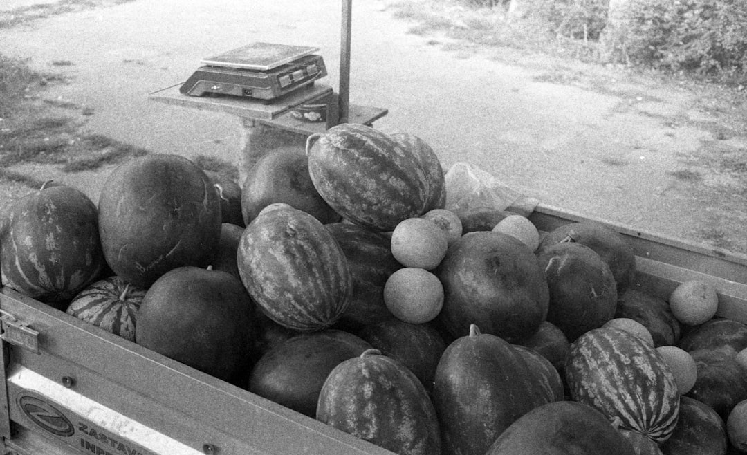 Novi Sad local market fresh produce rakija bottles