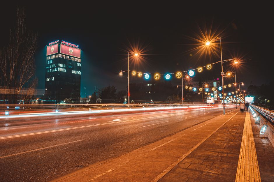 Millennium Bridge Sarajevo nightlife district evening lights