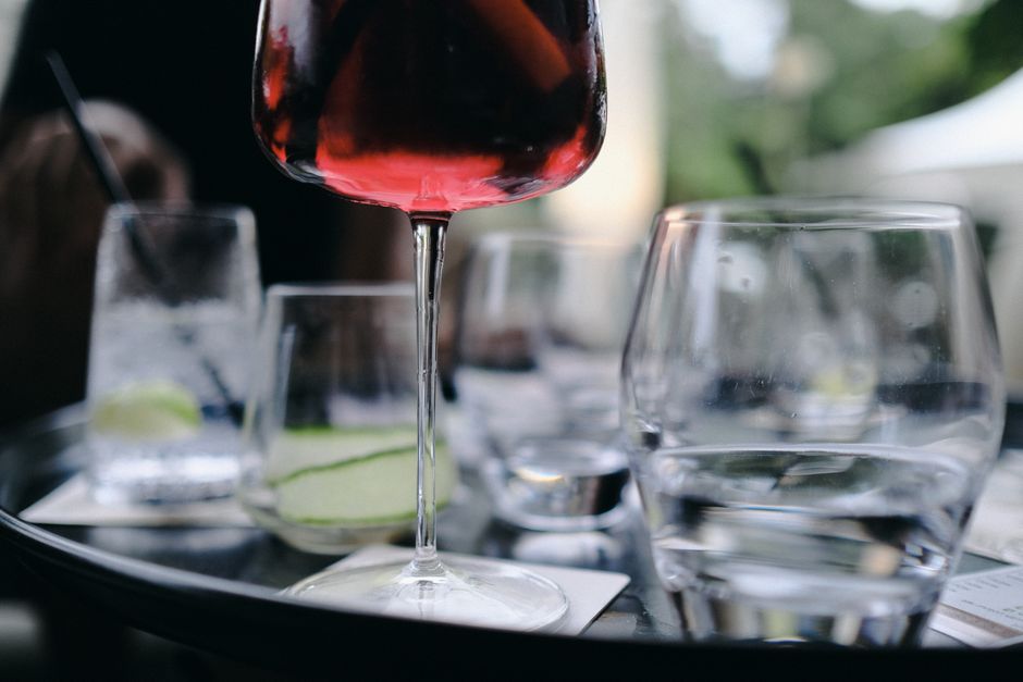 Limnos wine glass red table Greek taverna evening
