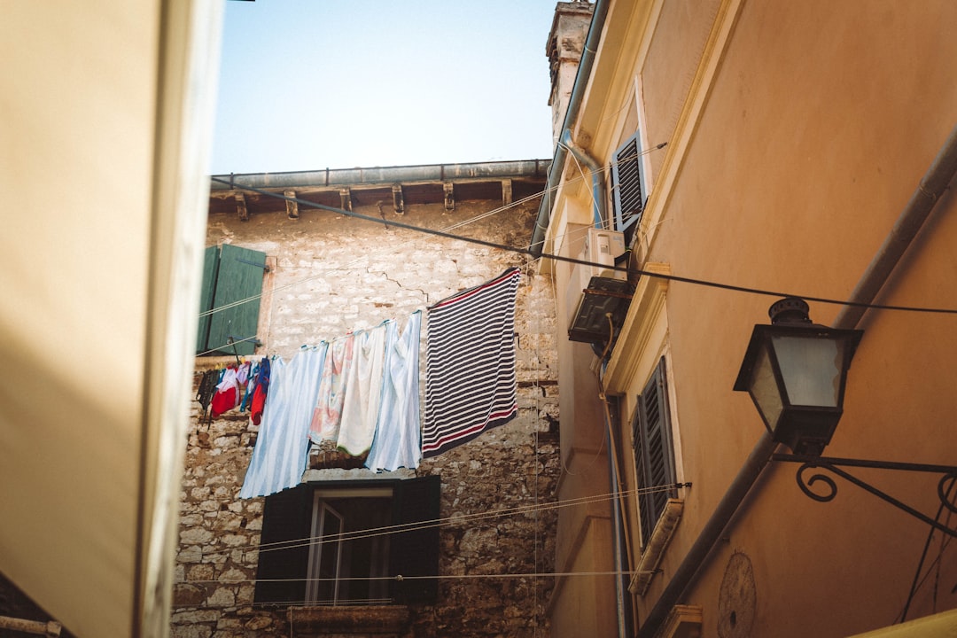 Old Town street Rovinj evening lights cafes people