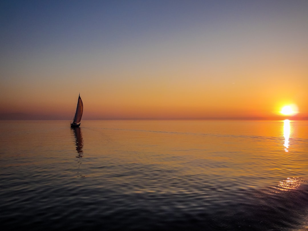 Sailing boat Peloponnese coast sunset blue water