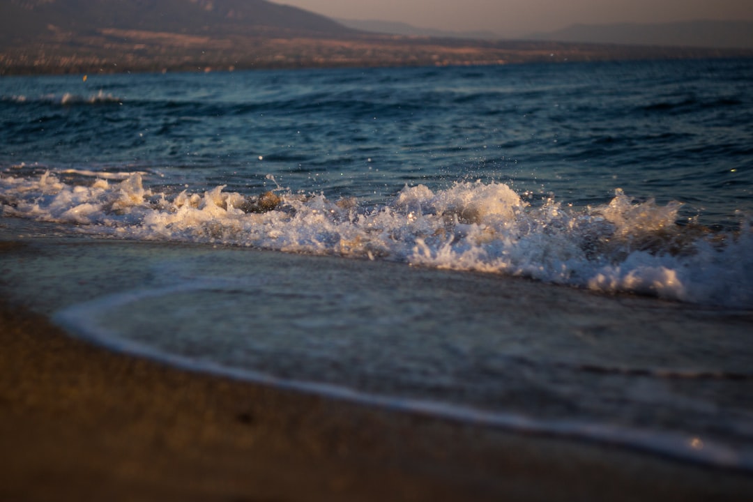 Greek beach sunset empty waves horizon