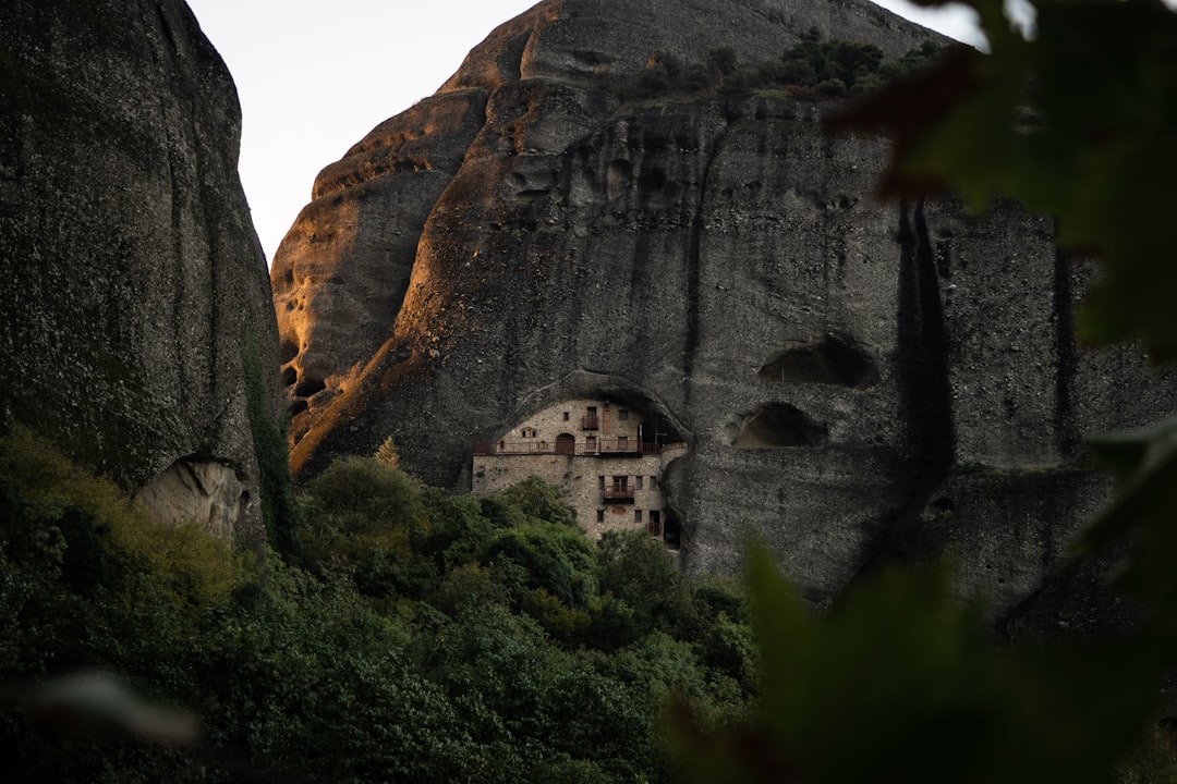 Meteora Greece monastery silhouette sunset quiet atmosphere
