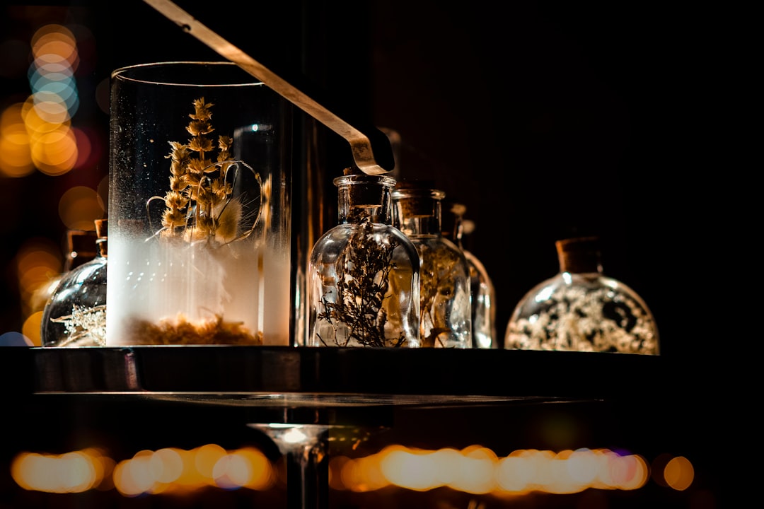 Bulgarian rakia bottle glass winter night bar
