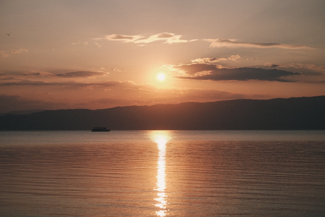 Ohrid Salt Lake Macedonia shallow saline water floating tourists sunset