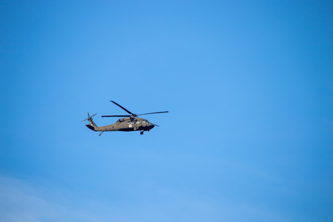 US Army AH-64 Apache helicopter in flight