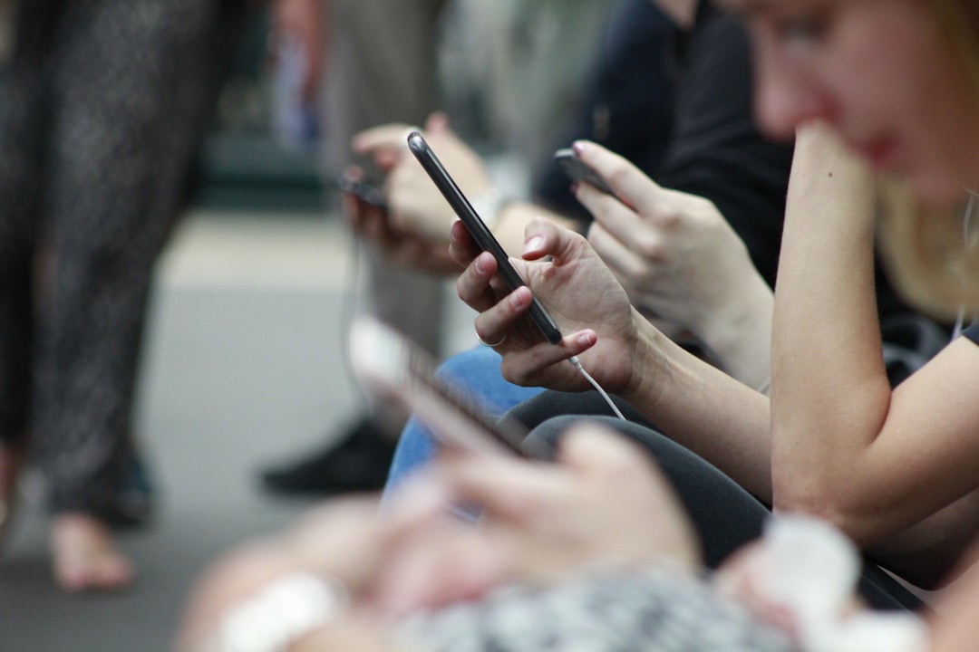 Balkan users checking phones during internet outage