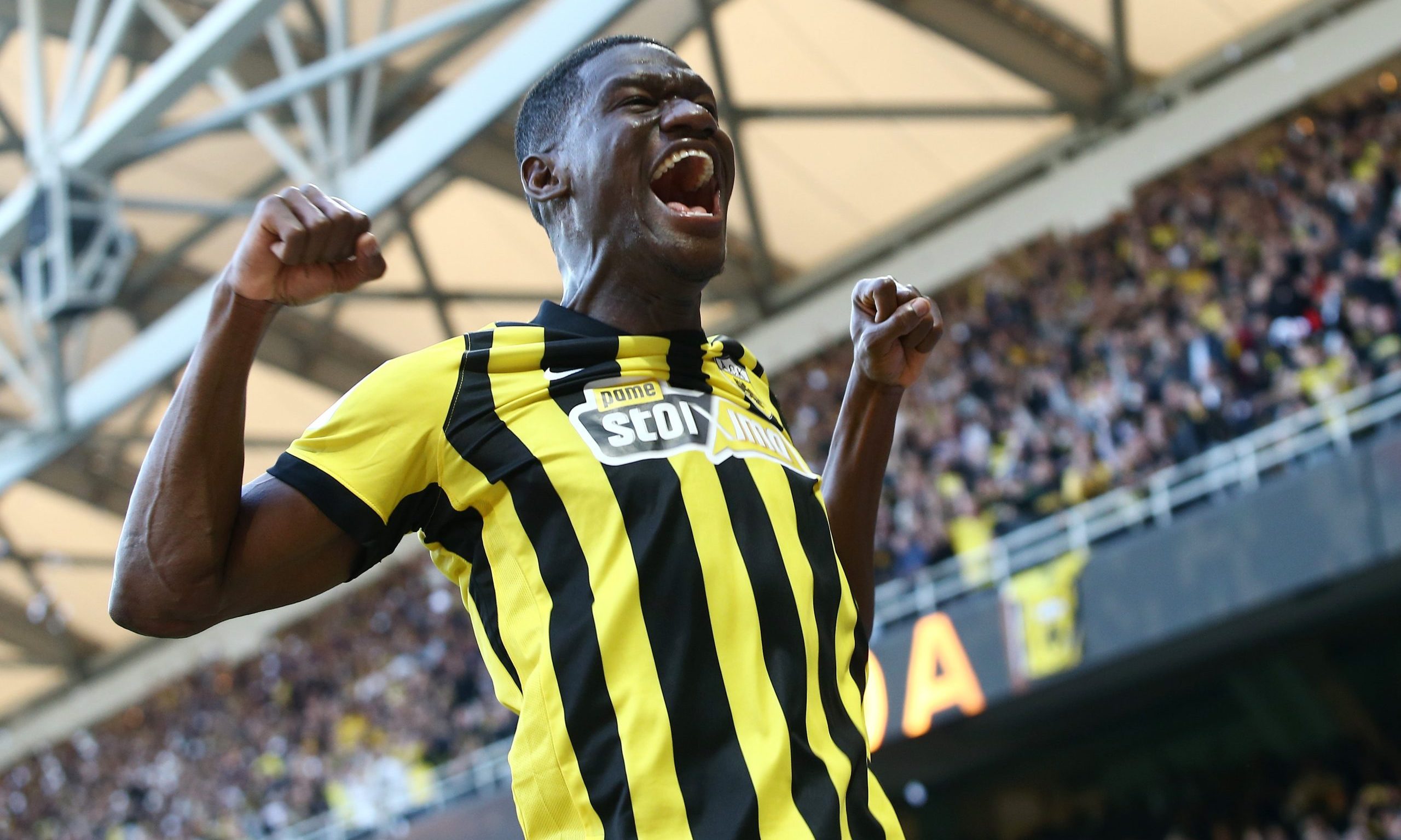 AEK: New Controversial Slogan for Zini by Original