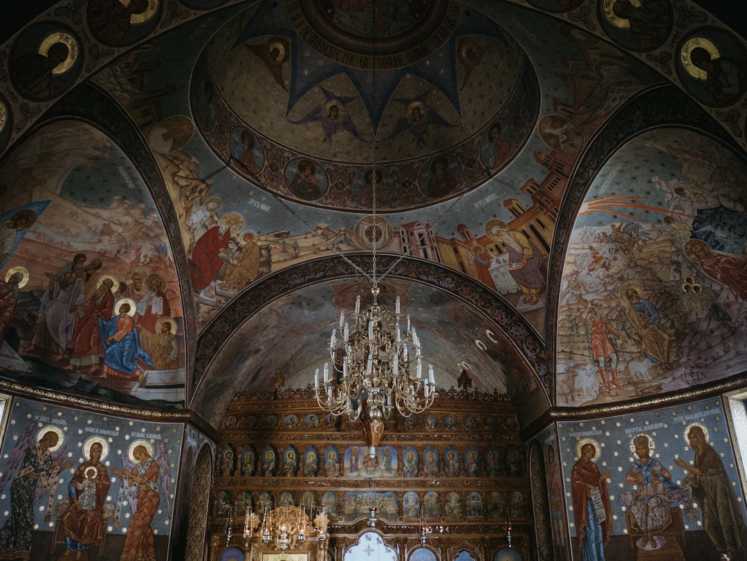 Studenica Monastery Church of the Virgin interior frescoes dim light