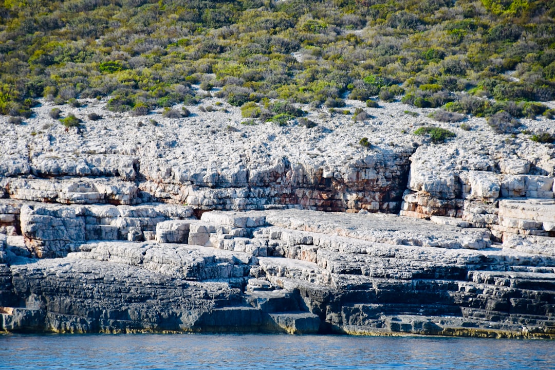 Krka Beach Vis Island Croatia hidden cove clear water rocks