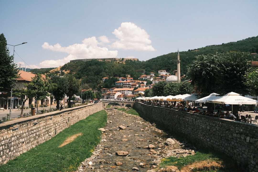 Prizren Old Bazaar Kosovo narrow cobblestone street shops morning light
