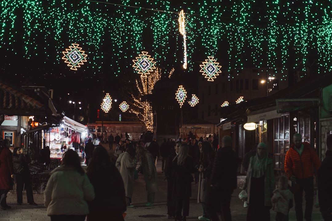 Sarajevo nightlife Ali Pasa Street bars crowds evening lights