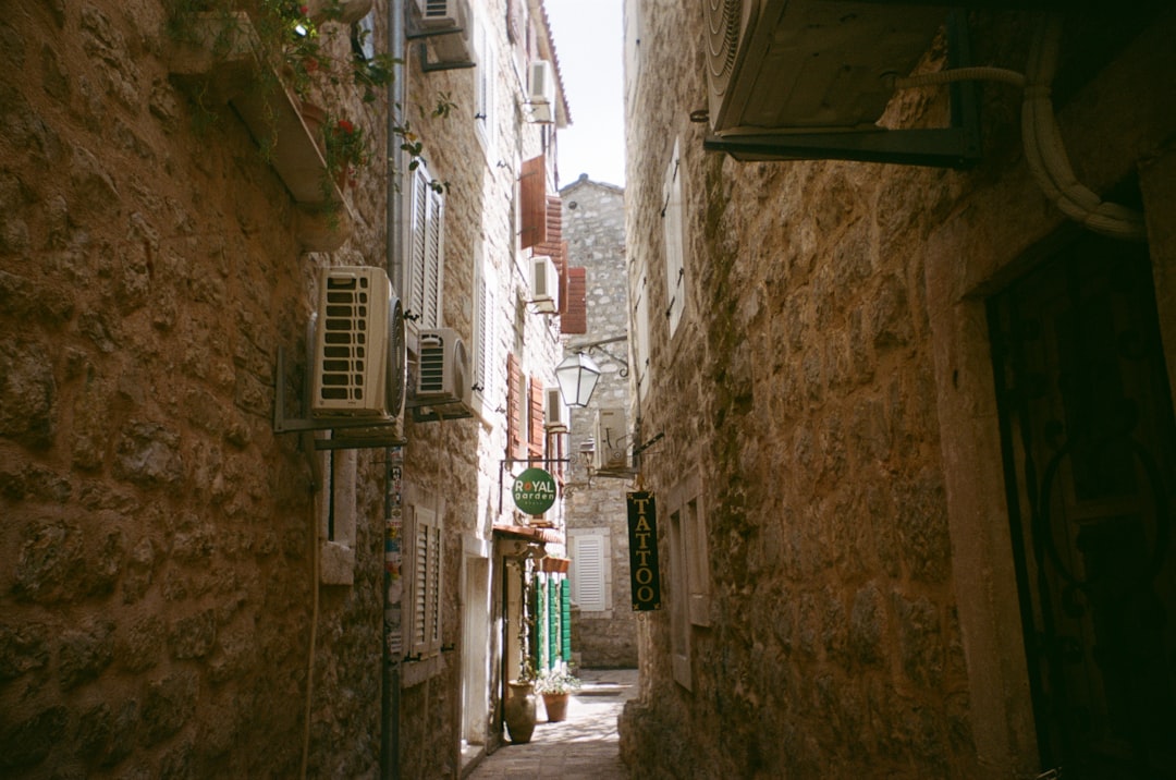 Pristina Old Bazaar narrow street copper shops morning