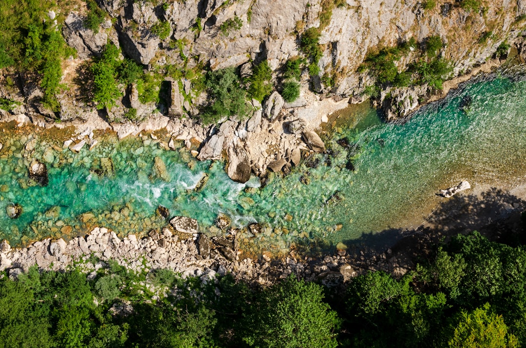 Neretva River source canyon Bosnia vertical limestone cliffs turquoise water