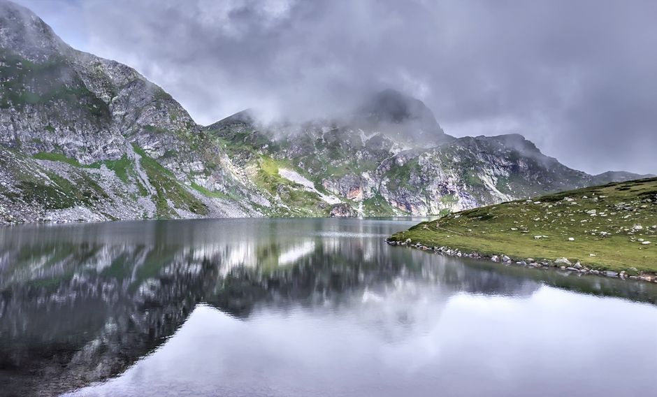 Seven Rila Lakes Bulgaria upper lake alpine meadow reflection blue water