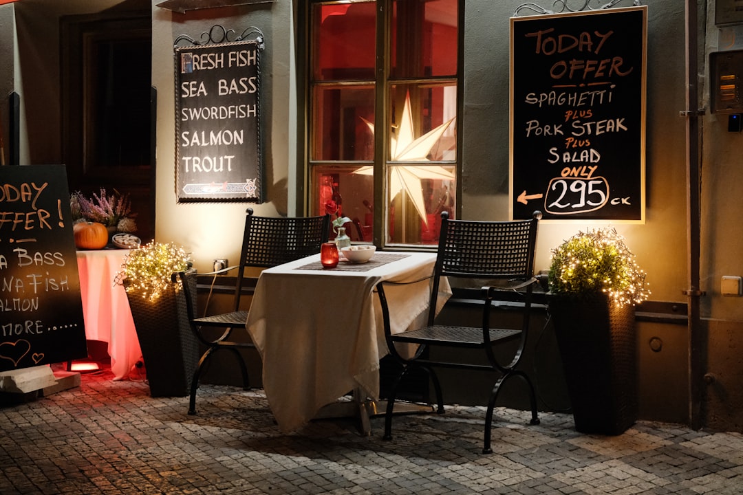 Piran harbor seafood restaurant outdoor dining evening atmosphere