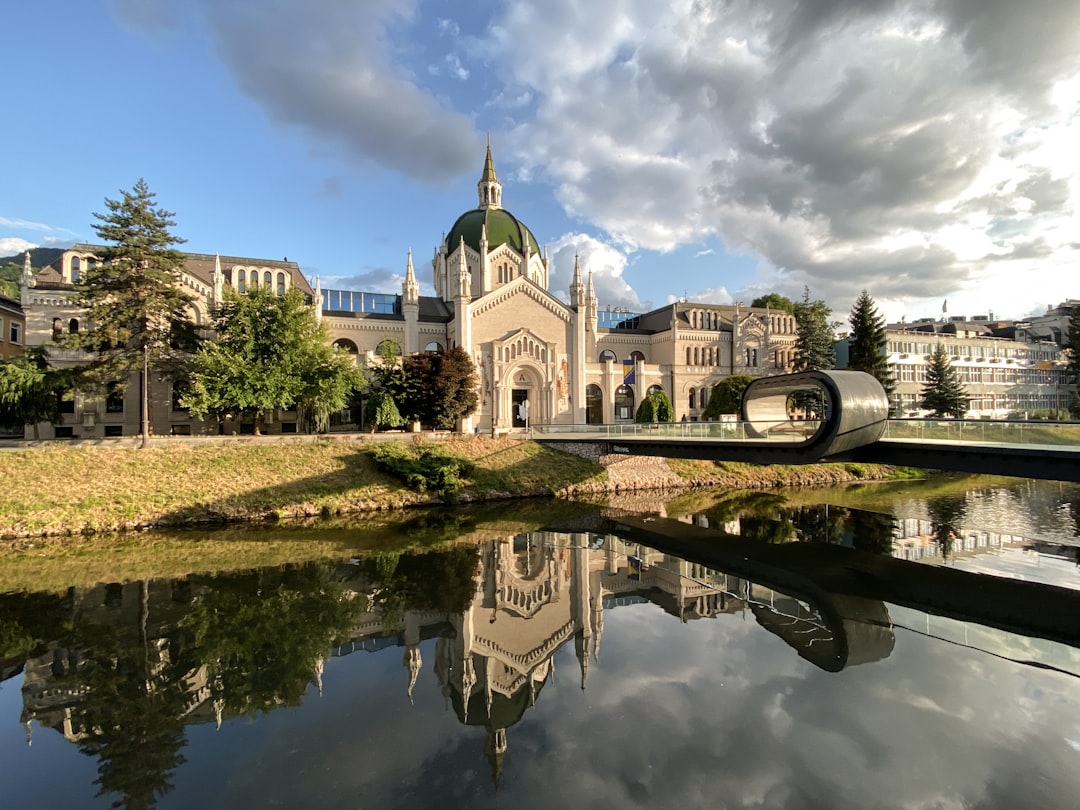 Sebilj Fountain Sarajevo swans stone octagonal afternoon light