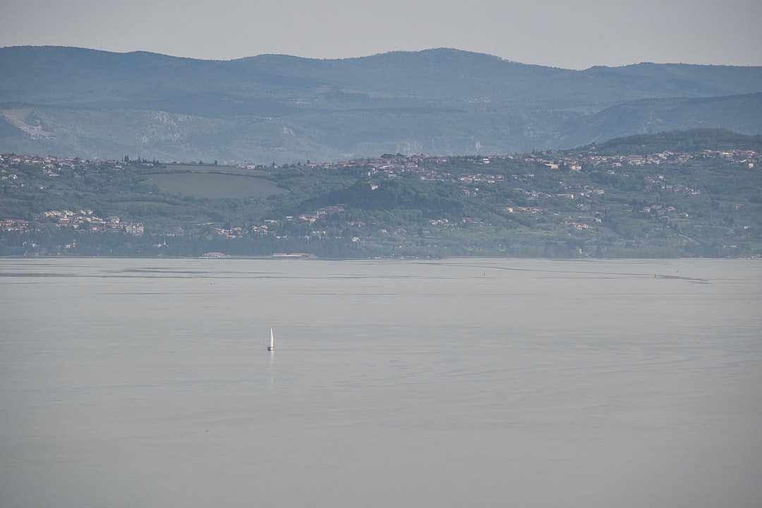 Piran Slovenia salt pans geometric turquoise water flamingos