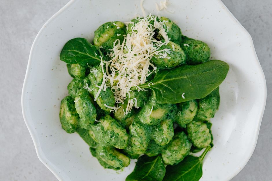 Slovenian struklji dumplings plate with cheese and spinach