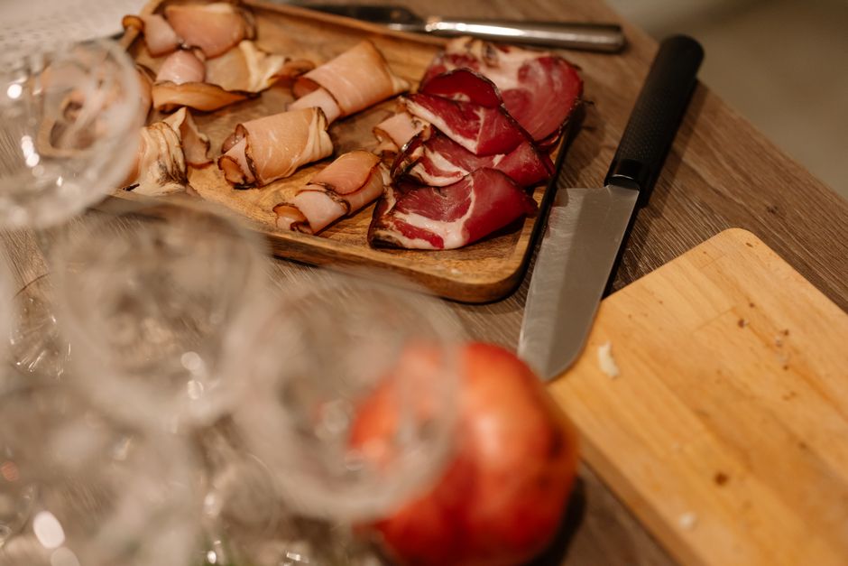 Tokaji Szalonna Hungarian smoked bacon platter with aszu wine glass rustic table
