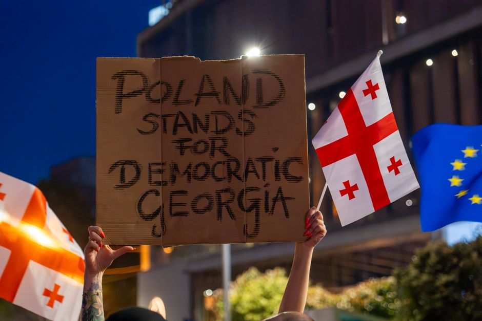 Tbilisi rally protesters European Union flags 2026