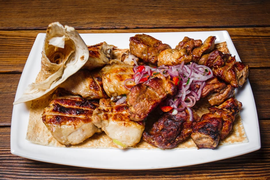 Mostar cevapi grilled meat flatbread onions street food