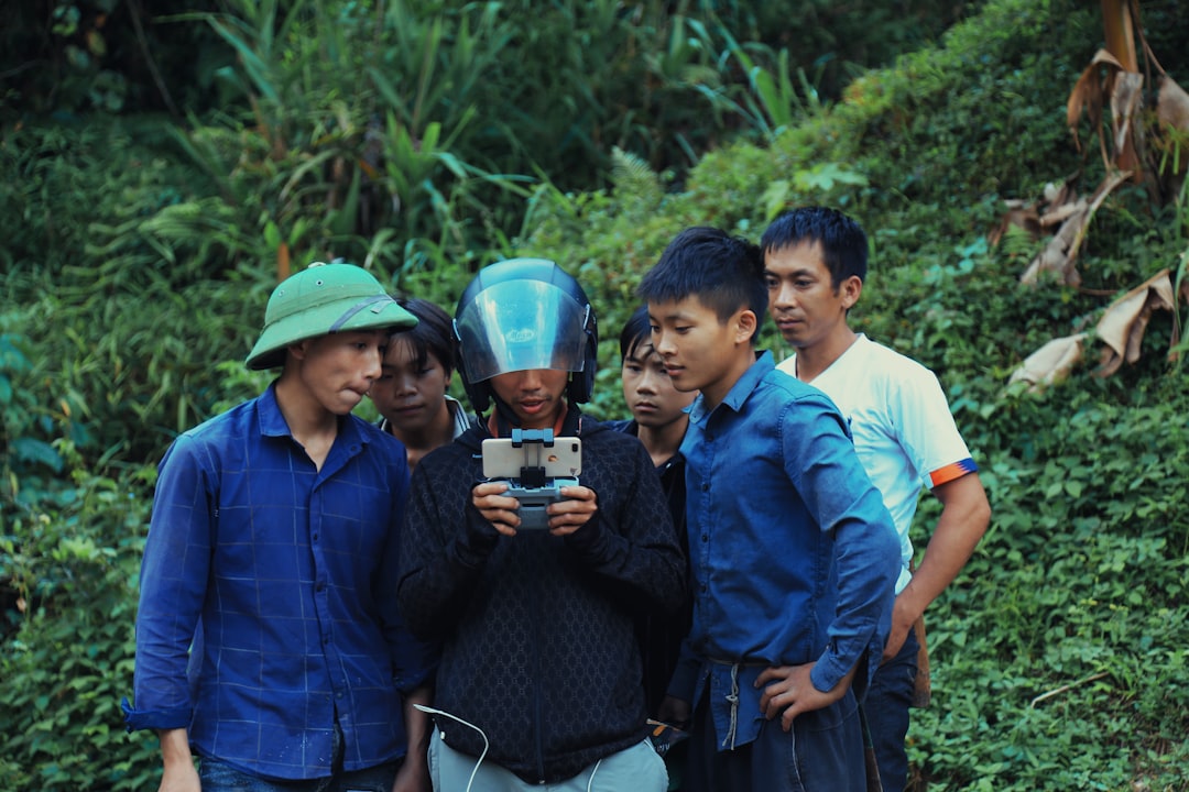 Vietnamese forest ranger checking map