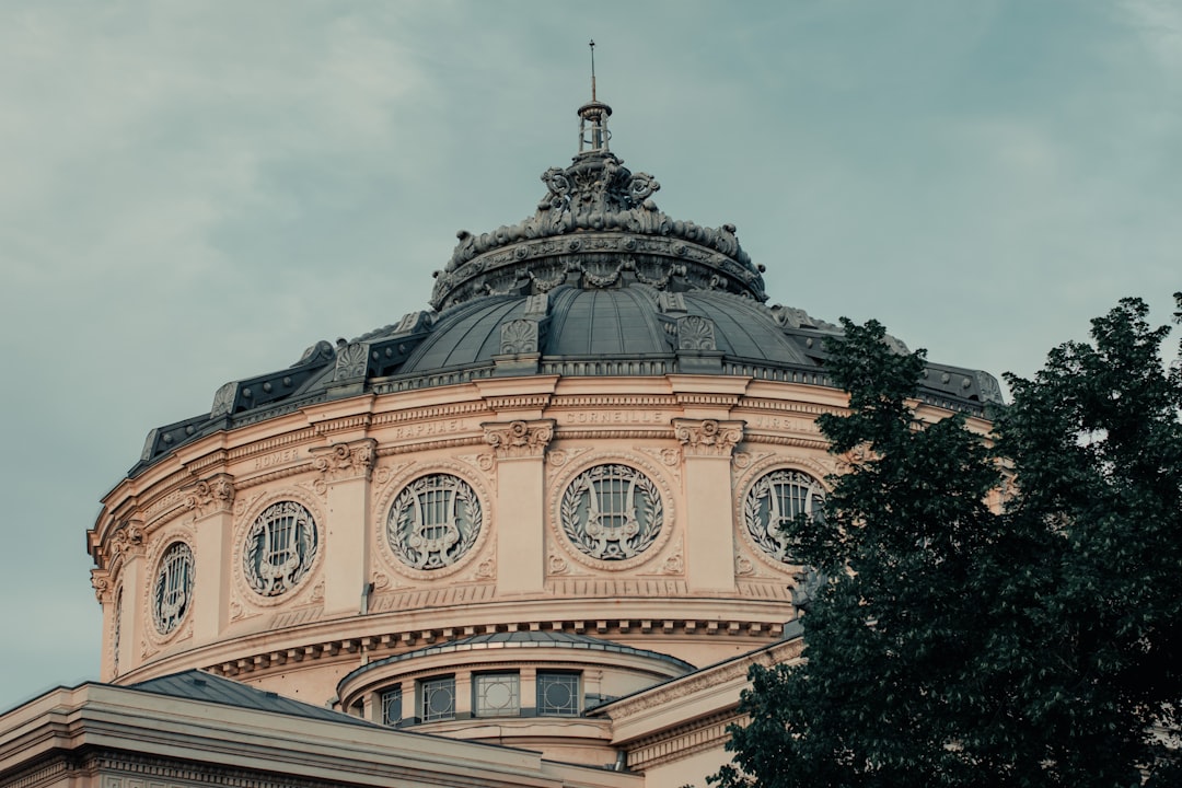 Bucharest Athenaeum dome evening light neoclassical architecture