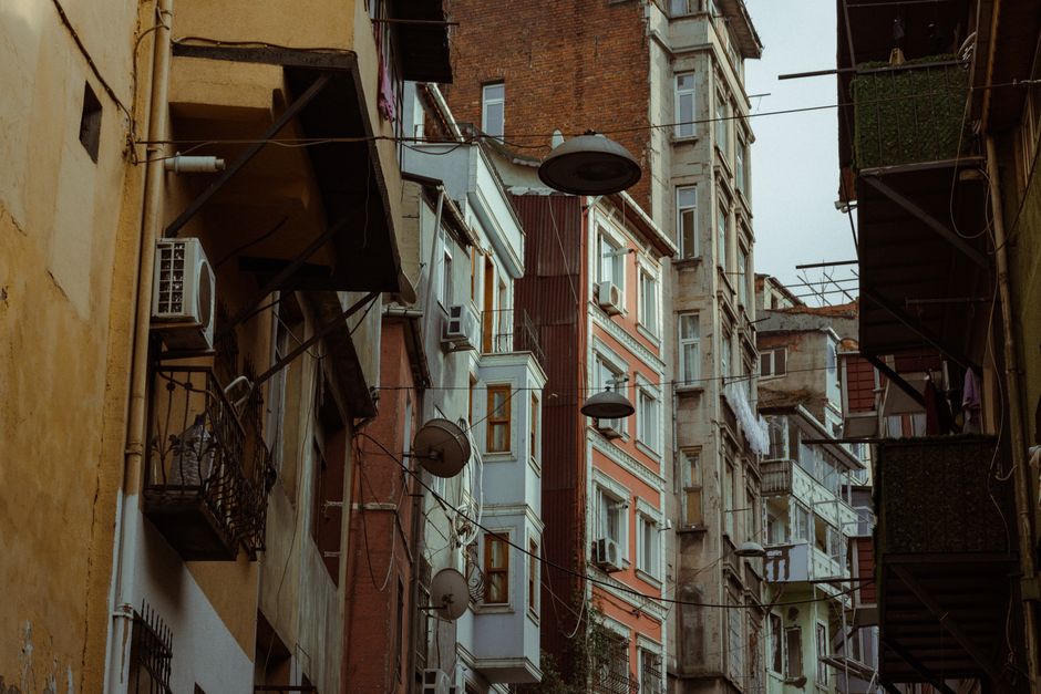 Kapikule Quarter Plovdiv stone houses wooden balconies narrow street evening