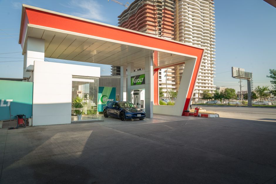 Electric car charging station Balkan highway landscape