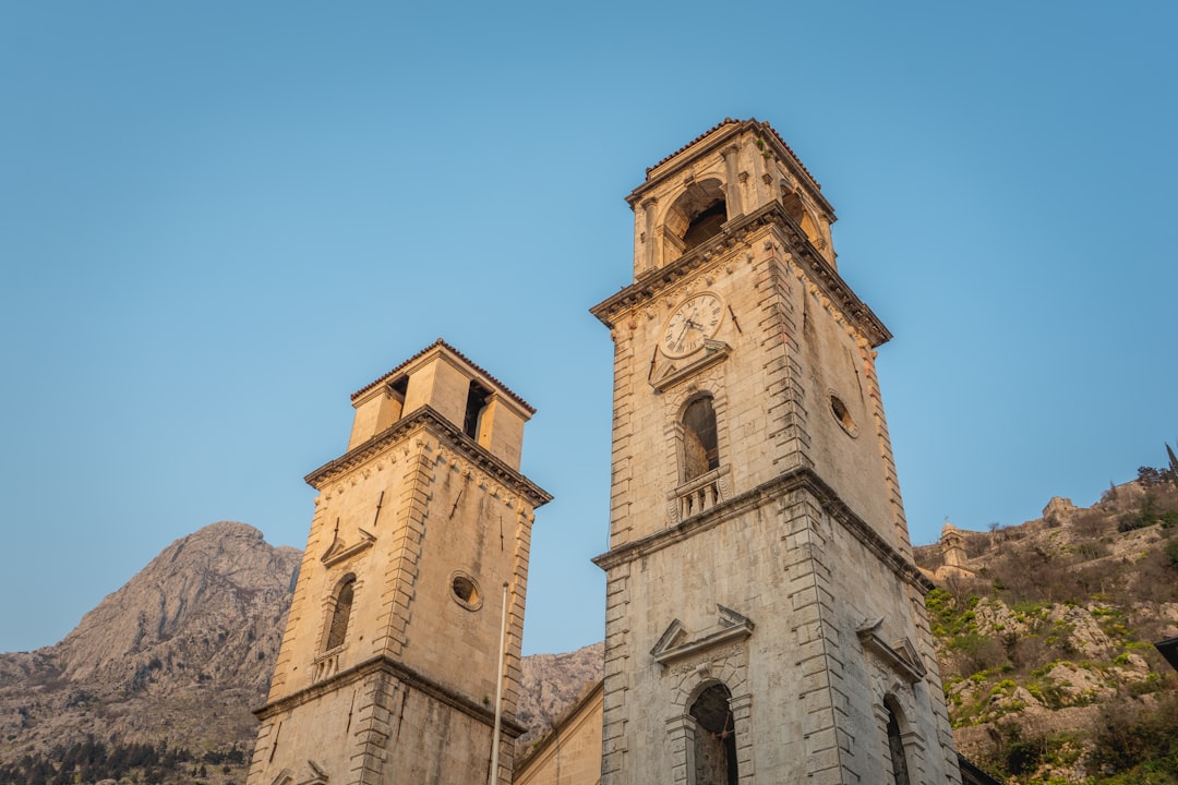 Kotor Montenegro walled city sunset Cathedral of St Tryphon bell tower