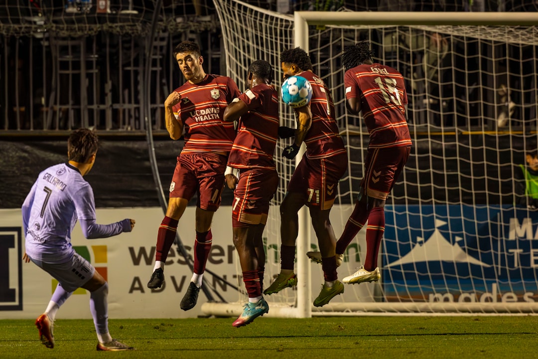 Moldovan football players celebrating goal stadium