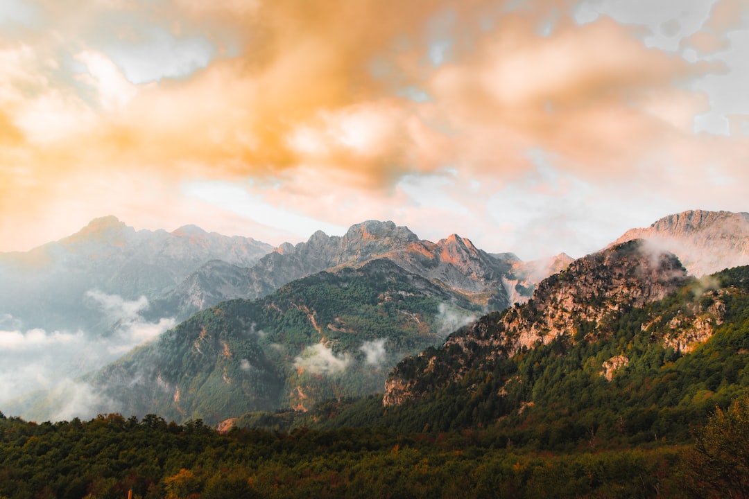 Accursed Mountains Albania rocky peaks misty morning atmosphere