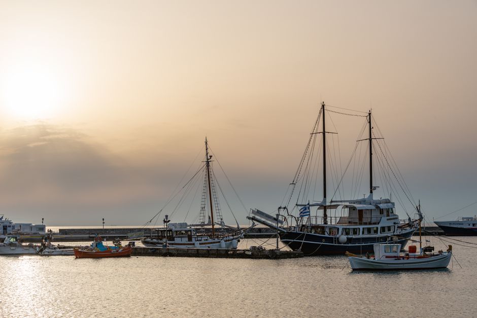 Koper harbor Slovenia sunset fishing boats golden light
