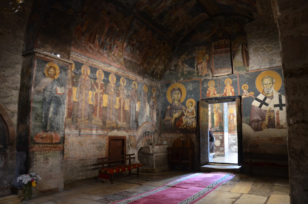 Holy Trinity Monastery Skopje interior frescoes dim light