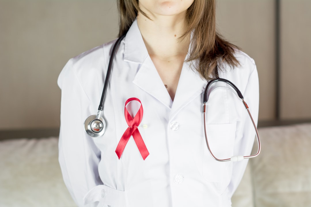HIV/AIDS awareness ribbon red symbol