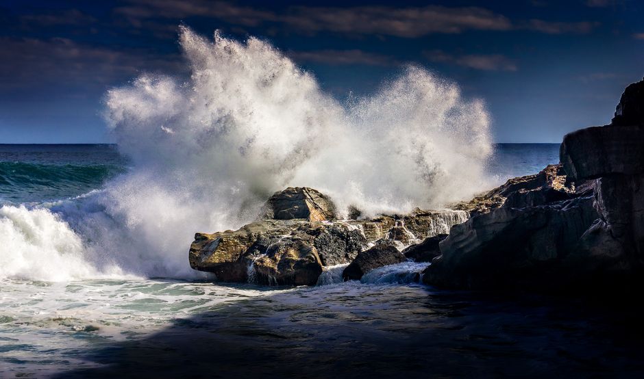 wave crashing against sharp rocks Viganj Croatia Adriatic coast