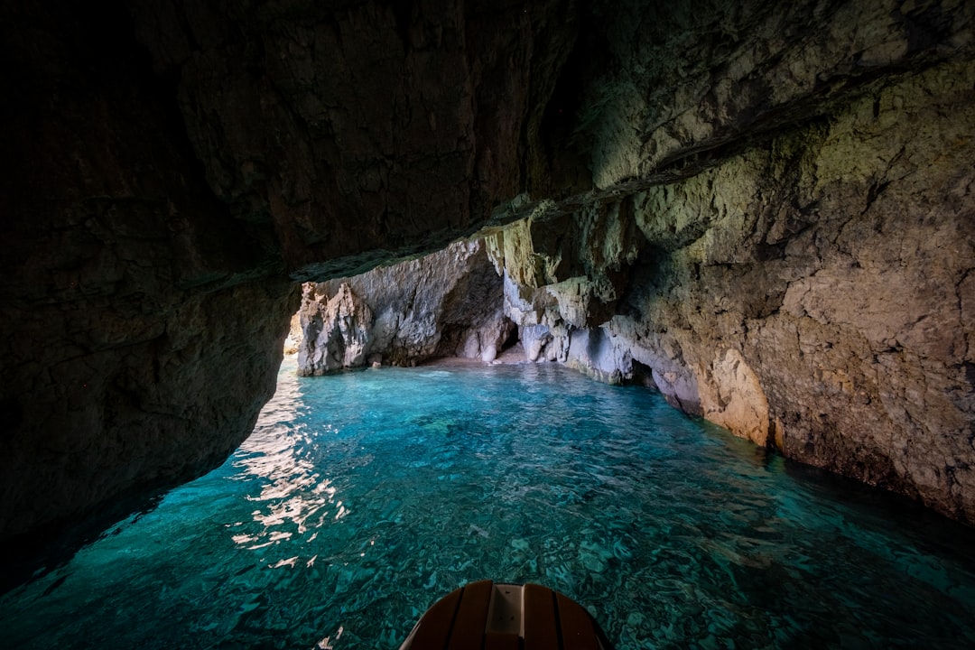 Marble caves Perast Montenegro kayak turquoise water limestone