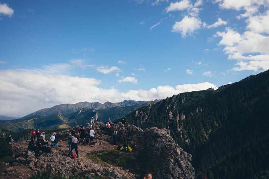 Peaga Pass Romania mountain trail panoramic view hikers backpacks
