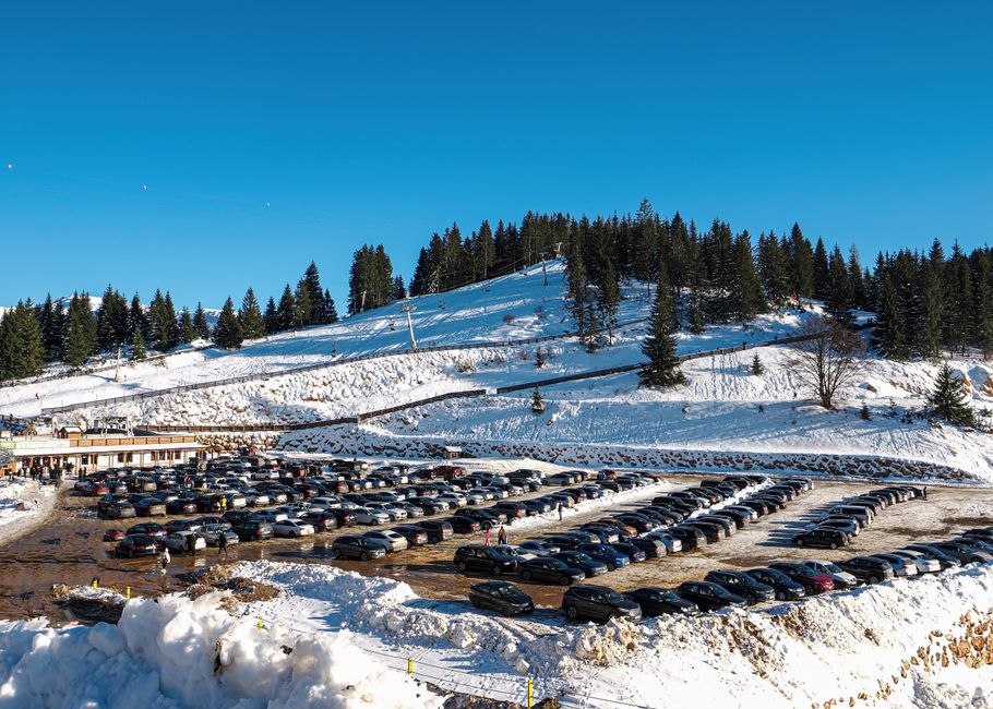 Rila Monastery Bulgaria parking lot cars mountain road