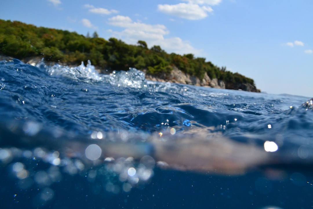 Underwater view of rusted WWII submarine hull Adriatic Sea Croatia