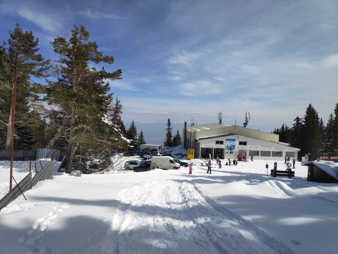 Dobrati Ski Resort Bulgaria parking area mountain road approach