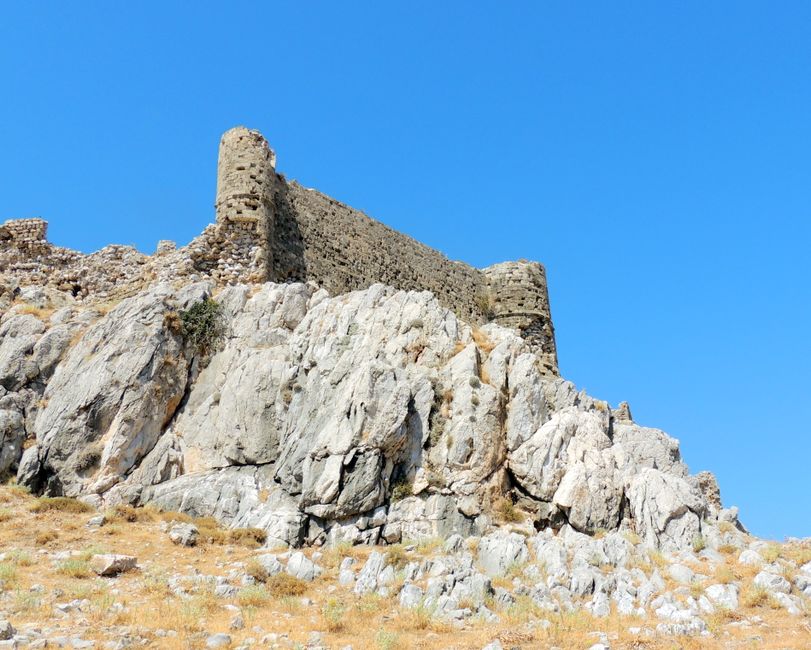 Castle of Ierissos Greece ruins cliff top view Aegean Sea blue sky