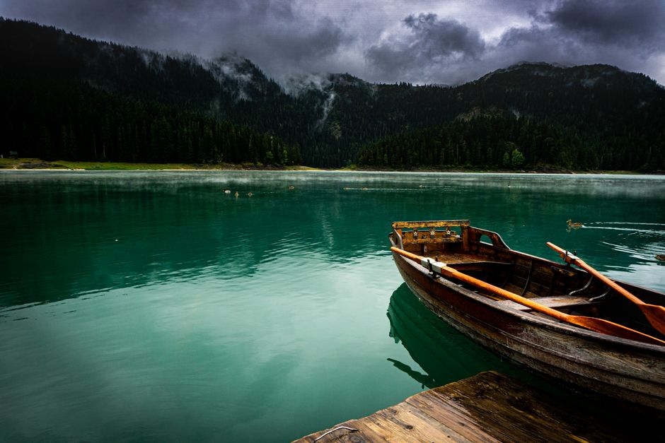 Crno Jezero Durmitor Montenegro morning mist reflection Seven Sisters peaks