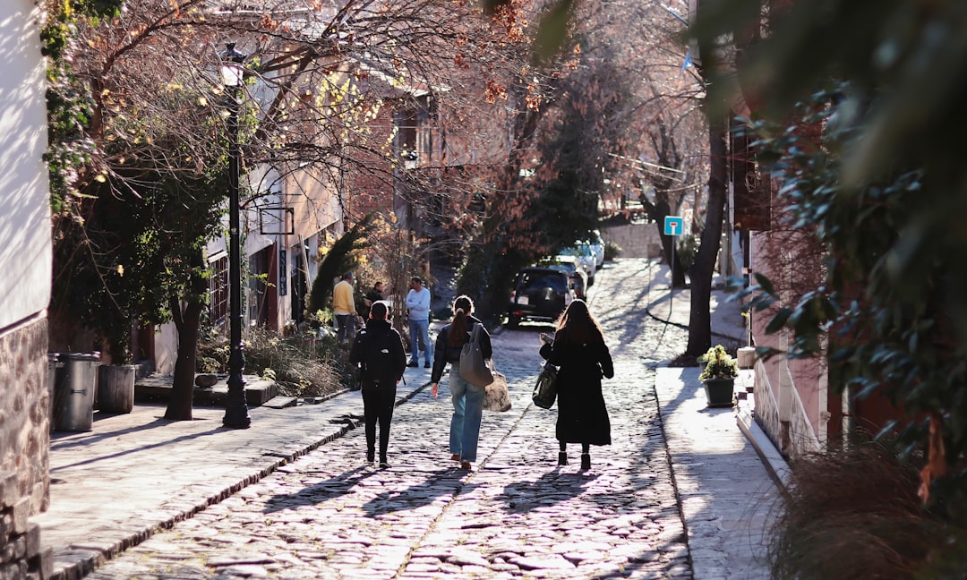 Old Town Bazaar Plovdiv narrow alley shops textiles spices morning light