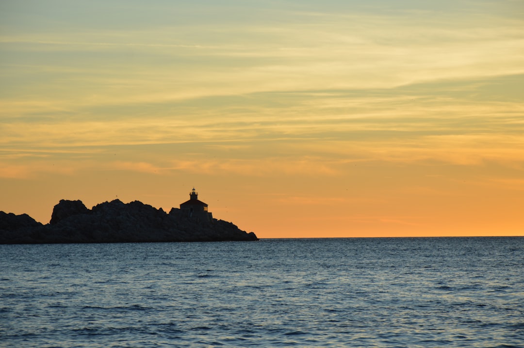 Punta Palascia Lighthouse sunset cliffs Adriatic Sea