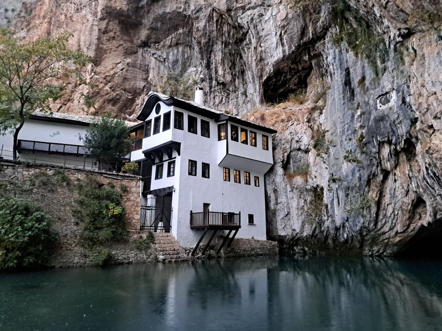 Neretva River gorge Bosnia Herzegovina steep limestone cliffs turquoise water kayak