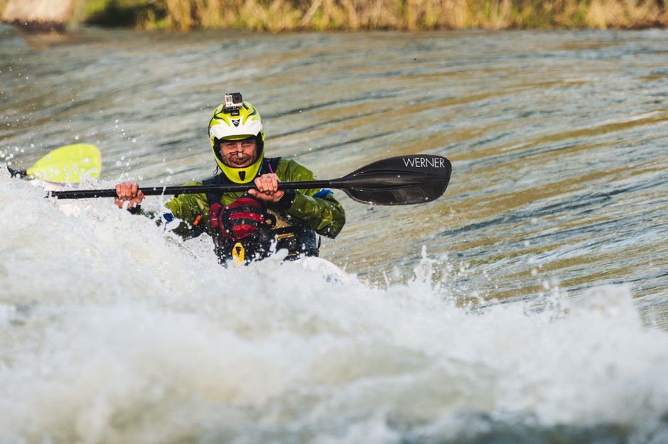 Kayaker navigating white water rapids Neretva River Blagaj Bosnia Herzegovina action shot
