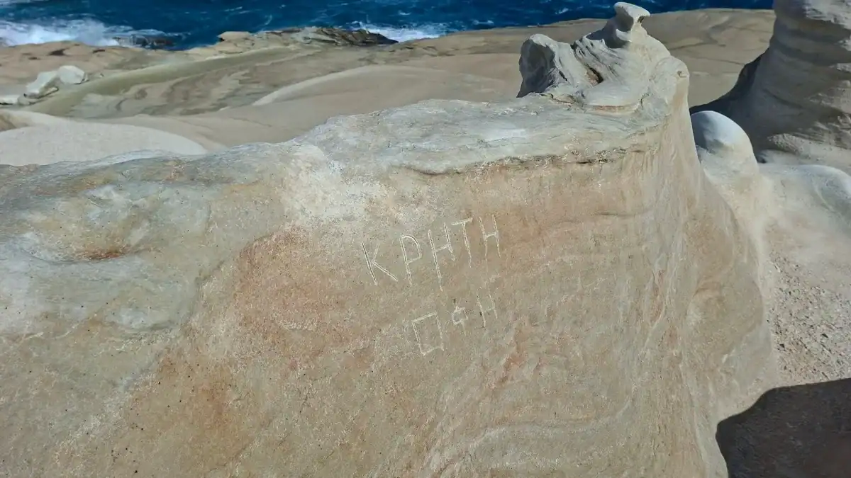 Vandalism at Sarakiniko: “Crete OFI” Inscribed on Milos’ Volcanic Rocks