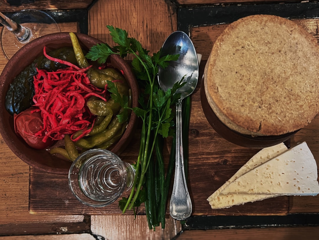 Bosnian mountain cuisine kajmak prshut bread rustic table setting